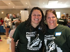 Staff volunteering at a community event.